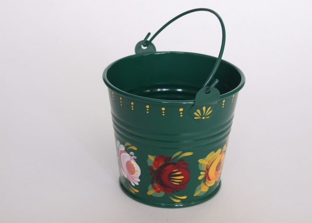 Green metal bucket Sylvia Hankin Artist on the Waterways