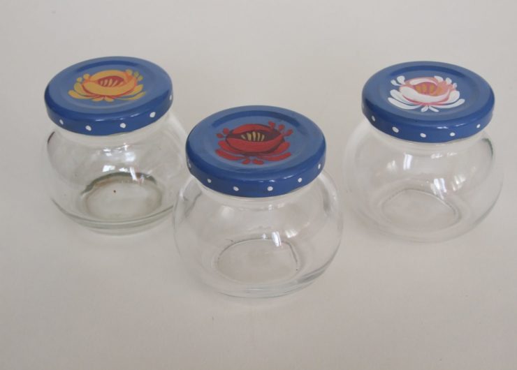Three small glass jars & lids